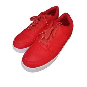 Red sneakers by Taxi